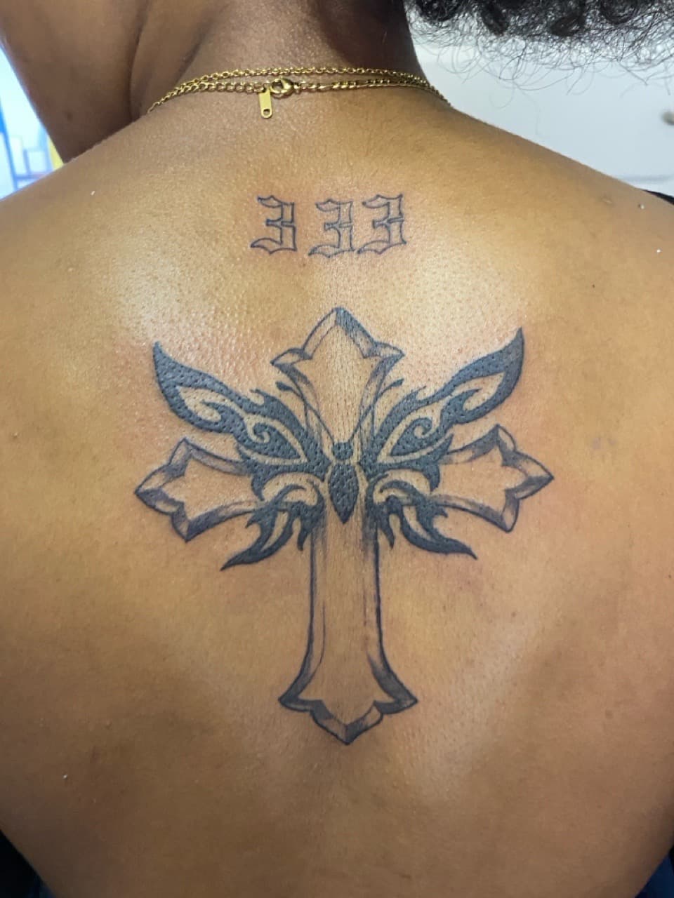 Black-work + Tribal cross tattoo on Upper Back by ArtIsTatts on TattMe