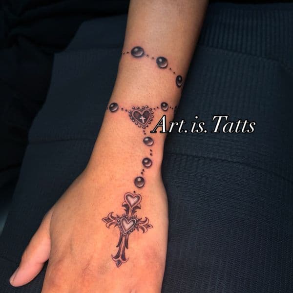 Black & Grey + Fine Line rosary tattoo on Hand by ArtIsTatts on TattMe