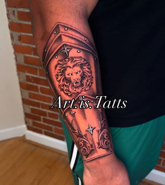Black & Grey + Illustrative lion tattoo on Forearm by ArtIsTatts on TattMe