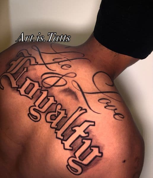 Lettering + Script loyalty tattoo on Upper Back by ArtIsTatts on TattMe