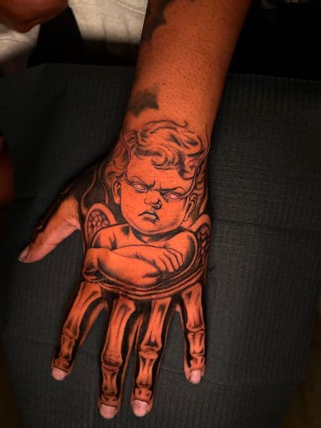 Black & Grey + Illustrative baby tattoo on Hand by ArtIsTatts on TattMe