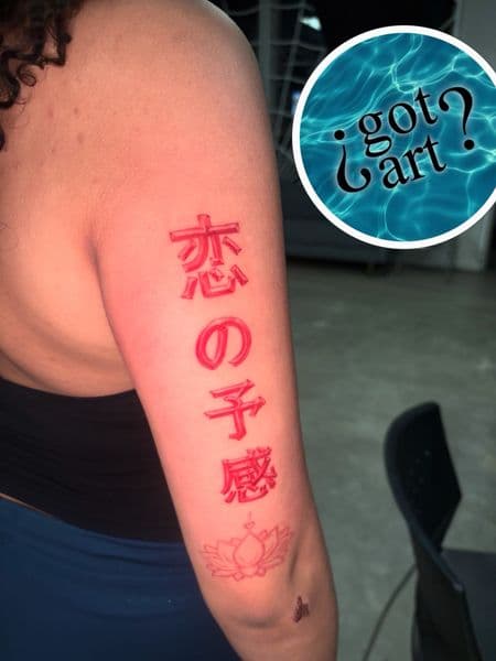 Lettering + Color characters tattoo on Upper Arm by ArtIsTatts on TattMe