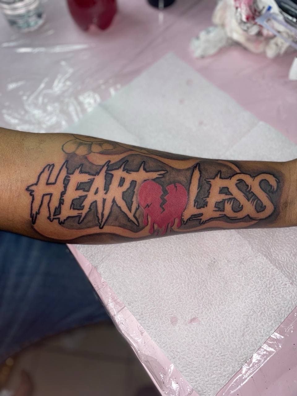 Lettering + Color broken heart tattoo on Forearm by ArtIsTatts on TattMe
