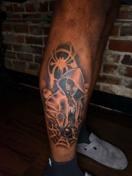 Black & Grey + Pop Culture spiderman tattoo on Calf by ArtIsTatts on TattMe