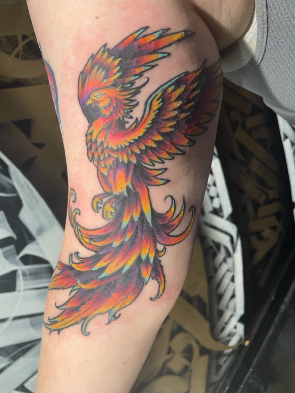 Color + New School phoenix tattoo on Upper Arm by Adawgsart on TattMe