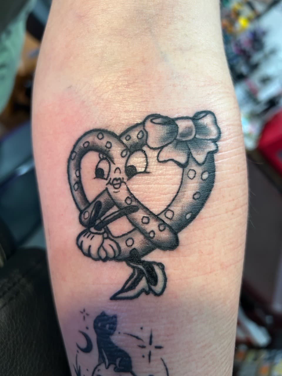 Illustrative + Cartoon pretzel tattoo on Forearm by Adawgsart on TattMe