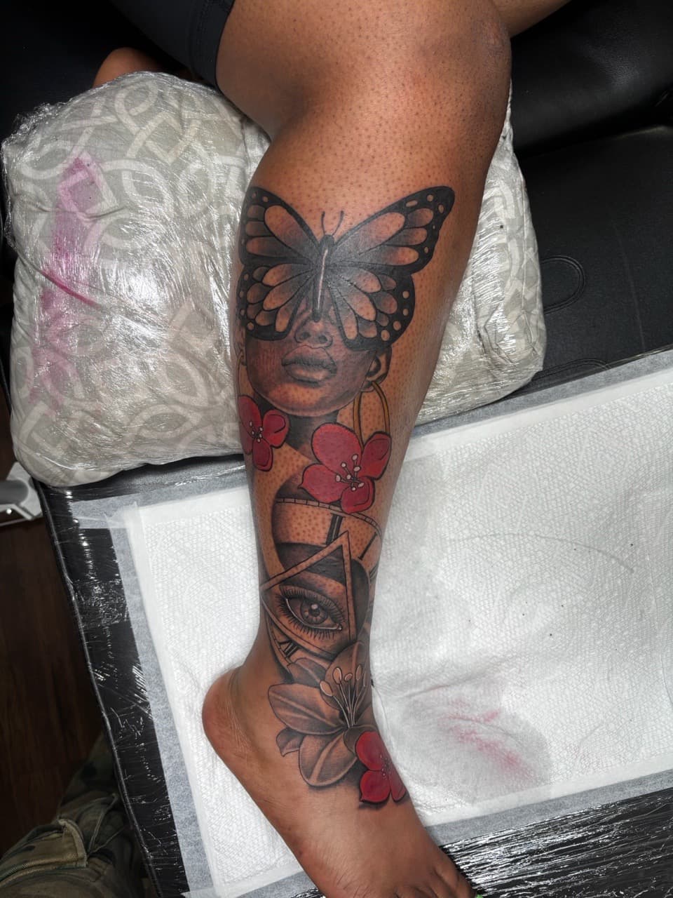 Black & Grey + Color butterfly tattoo on Calf by Ink_Mob_Studios on TattMe