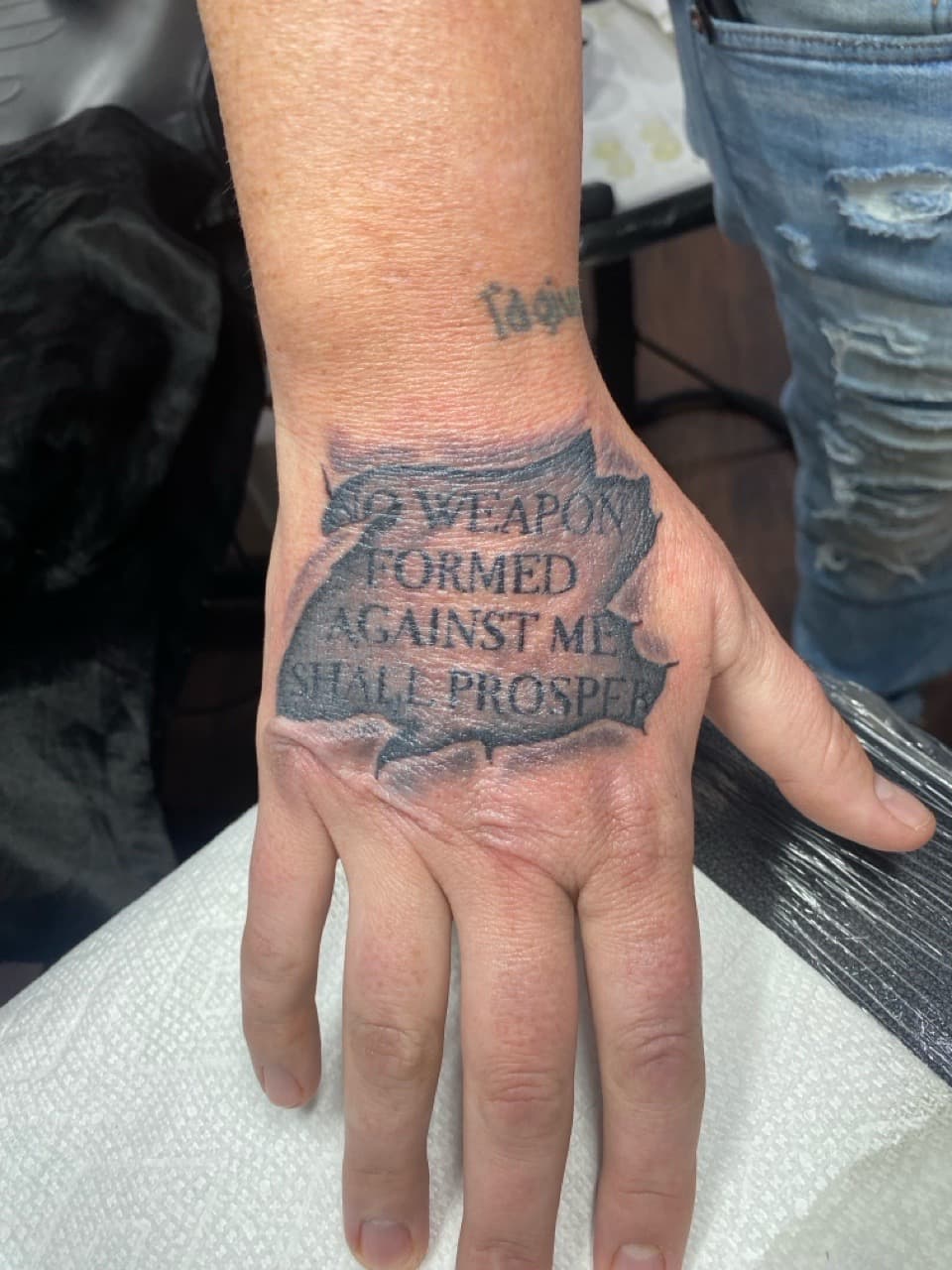 Lettering + Black & Grey quote tattoo on Hand by Ink_Mob_Studios on TattMe