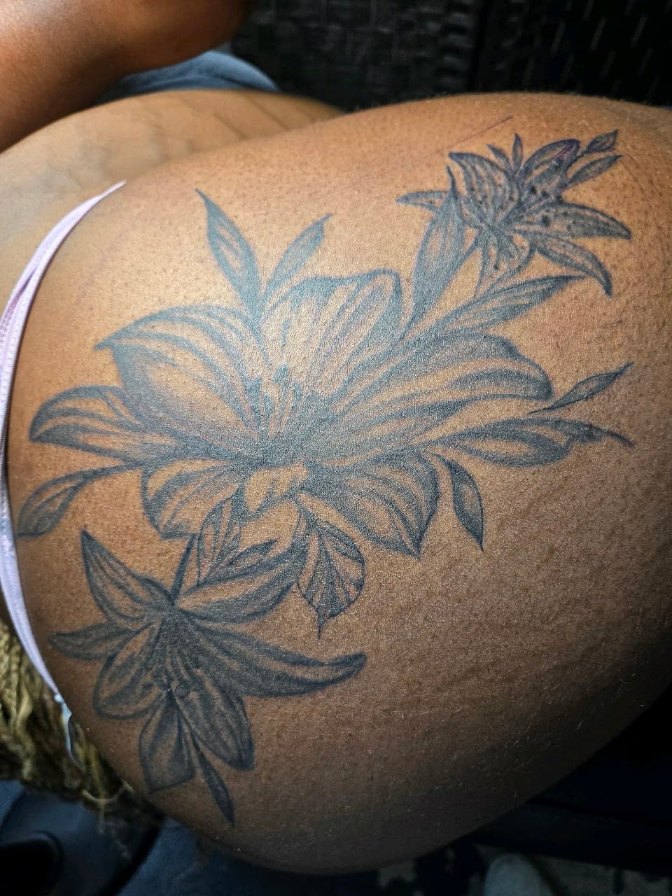 Floral + Black & Grey flowers tattoo on Thigh by Inkytat2z on TattMe