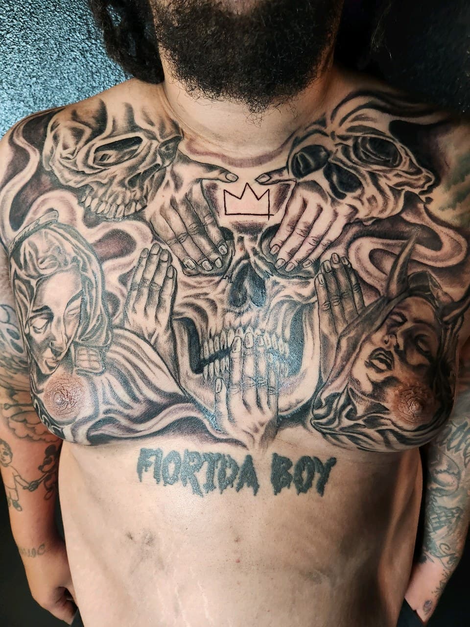 Black & Grey + Illustrative Realism skulls tattoo on Chest by Inkytat2z on TattMe