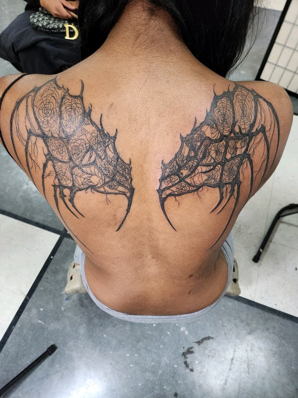 Black-work + Illustrative wings tattoo on Upper Back by Inkytat2z on TattMe