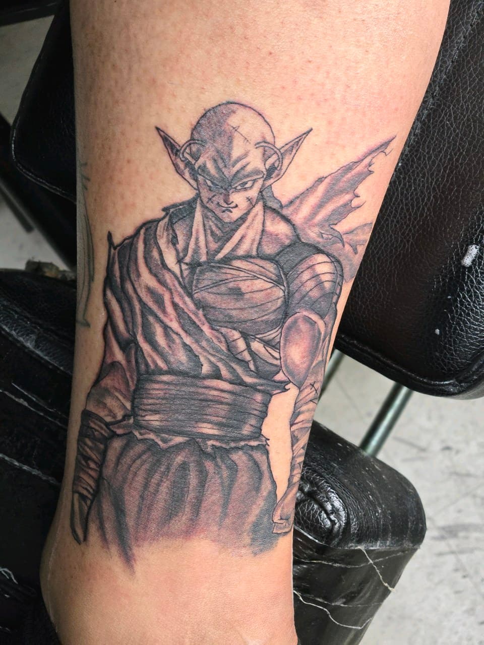 Anime + Black & Grey piccolo tattoo on Calf by Inkytat2z on TattMe