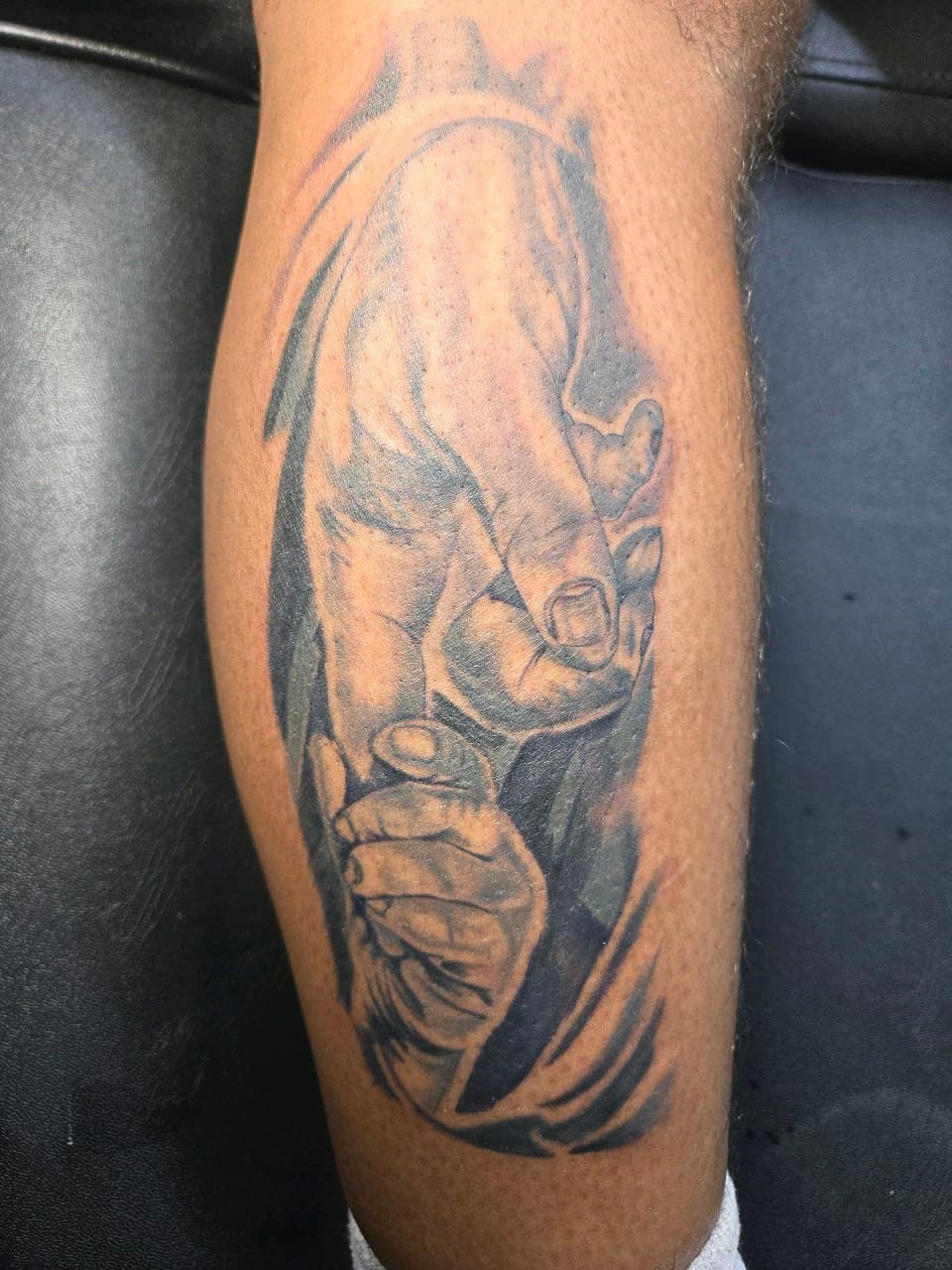 Black & Grey + Realism hands tattoo on Calf by Inkytat2z on TattMe