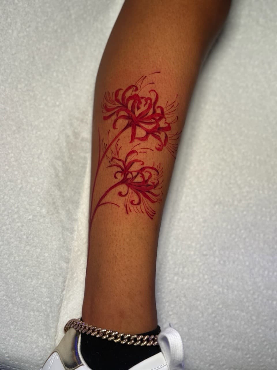 Fine Line + Floral spider lilies tattoo on Calf by SkaijRose on TattMe