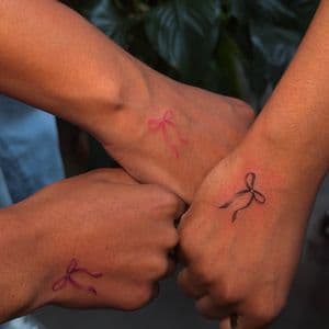 Fine Line + Minimalist bows tattoo on Hand by SkaijRose on TattMe