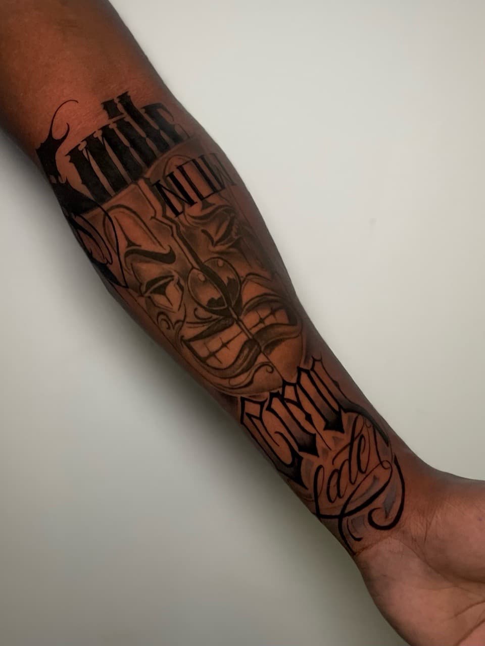 Black & Grey + Lettering clown tattoo on Forearm by SkaijRose on TattMe