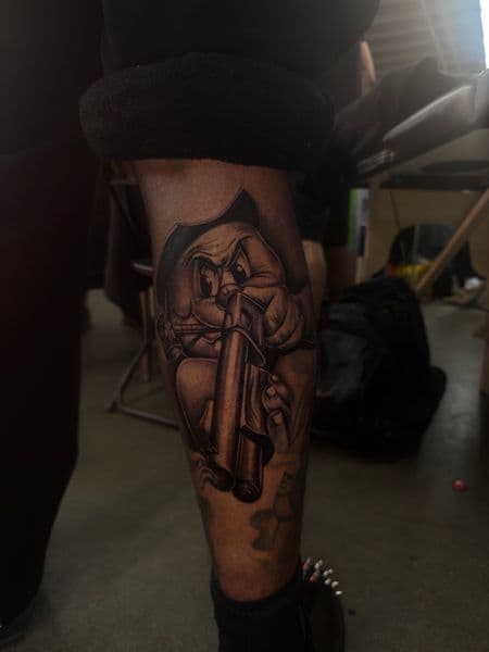 Black & Grey + Cartoon cartoon character tattoo on Calf by SkaijRose on TattMe