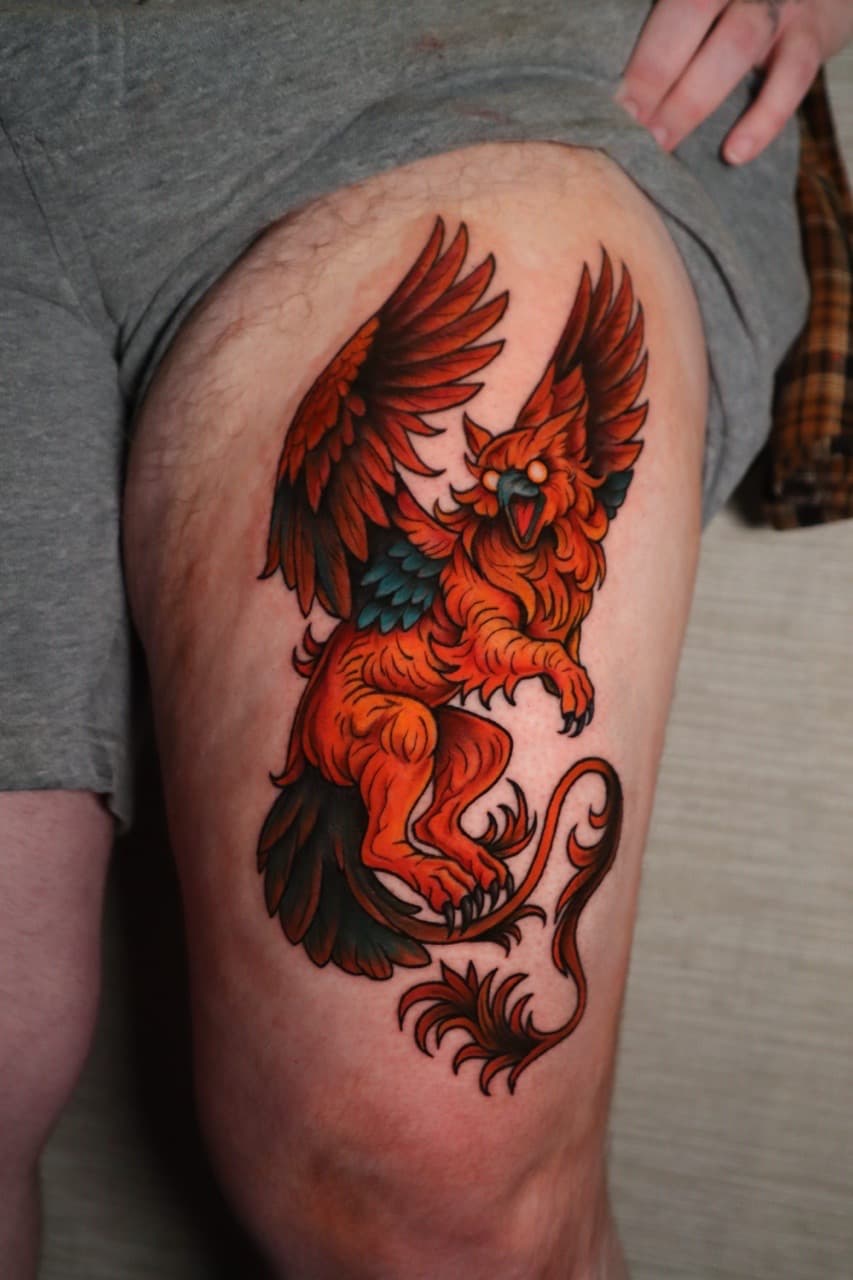 Color + Neo-Traditional griffin tattoo on Thigh by SkaijRose on TattMe