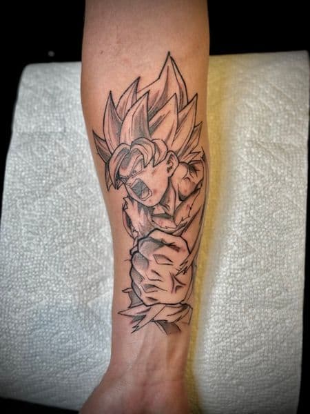 Anime + Illustrative goku tattoo on Forearm by Lalo_Ink_Tattoo on TattMe