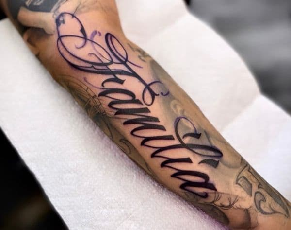 Lettering + Script familia tattoo on Forearm by Lalo_Ink_Tattoo on TattMe