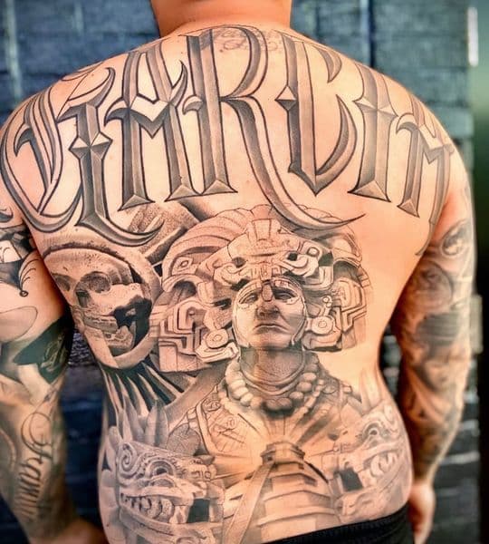 Black & Grey + Lettering lettering tattoo on Upper Back by Lalo_Ink_Tattoo on TattMe