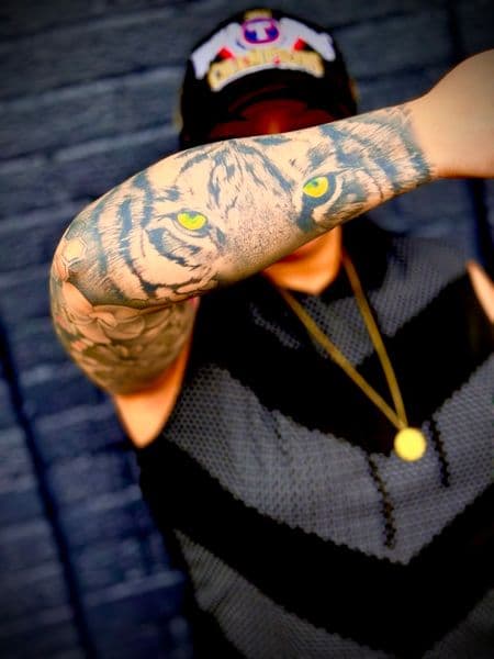 Black & Grey + Realism tiger tattoo on Forearm by Lalo_Ink_Tattoo on TattMe