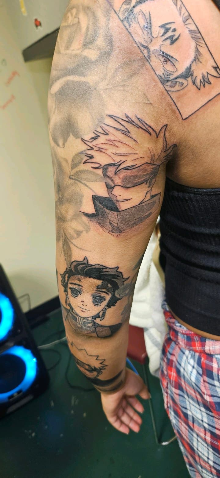 Anime + Black & Grey characters tattoo on Upper Arm by 2nd_Circle_Tattoo_Co on TattMe