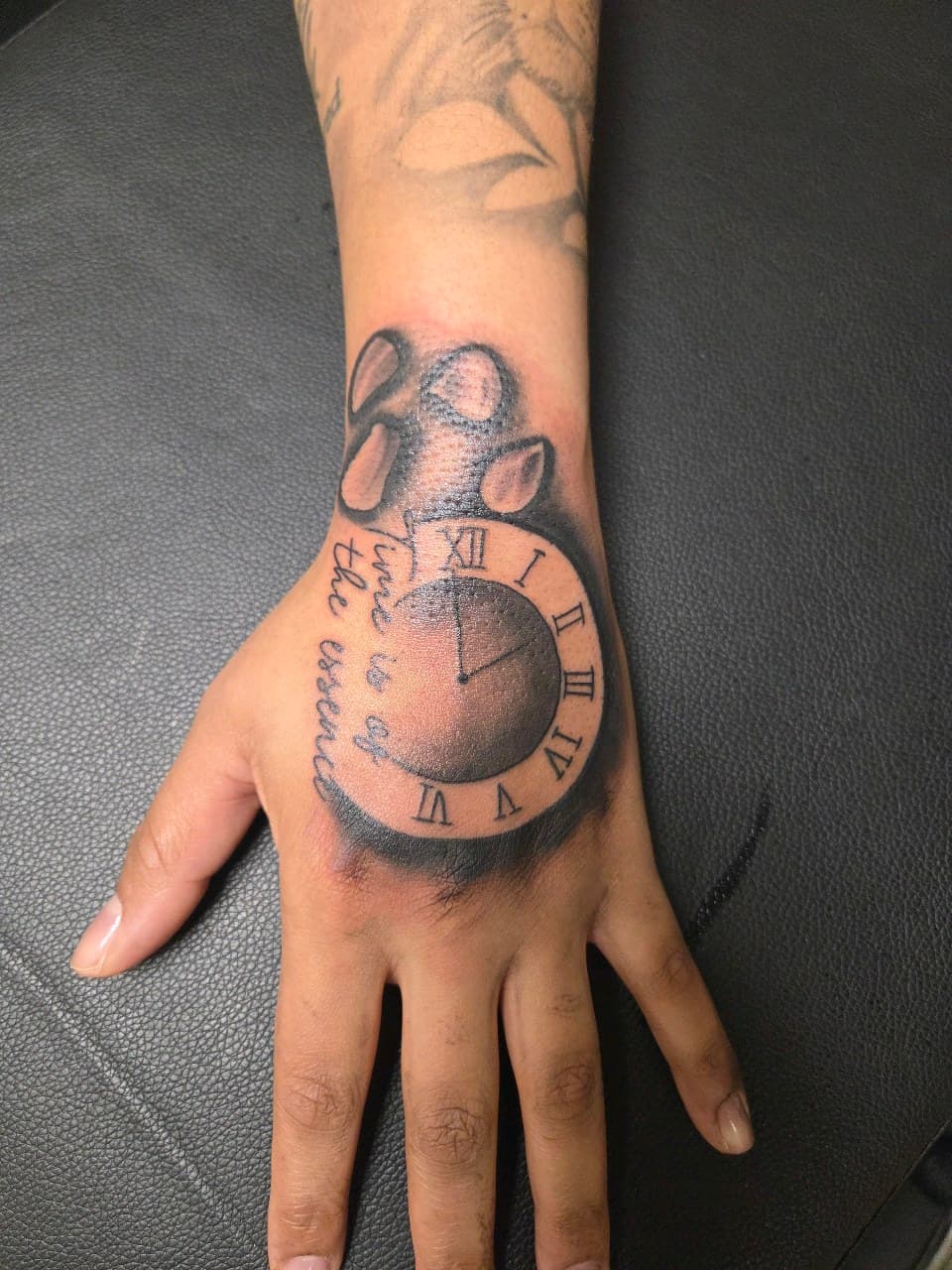 Black & Grey + Lettering clock tattoo on Hand by 2nd_Circle_Tattoo_Co on TattMe