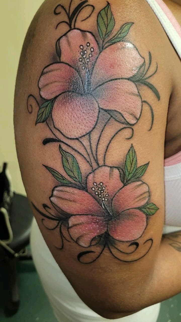 Floral + Color flowers tattoo on Upper Arm by 2nd_Circle_Tattoo_Co on TattMe
