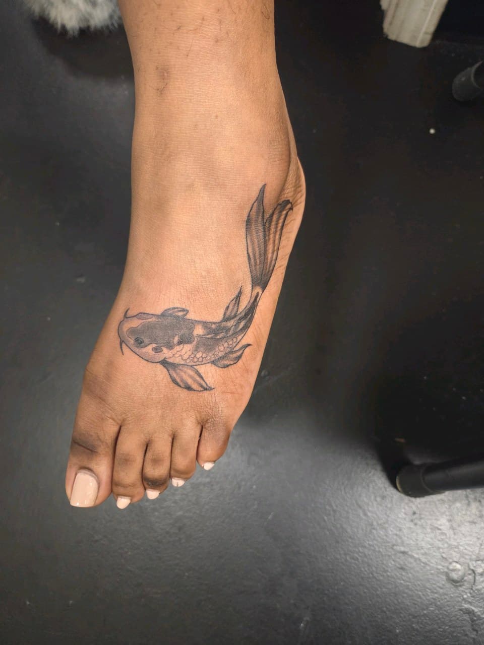 Black & Grey + Japanese koi fish tattoo on Foot by 2nd_Circle_Tattoo_Co on TattMe