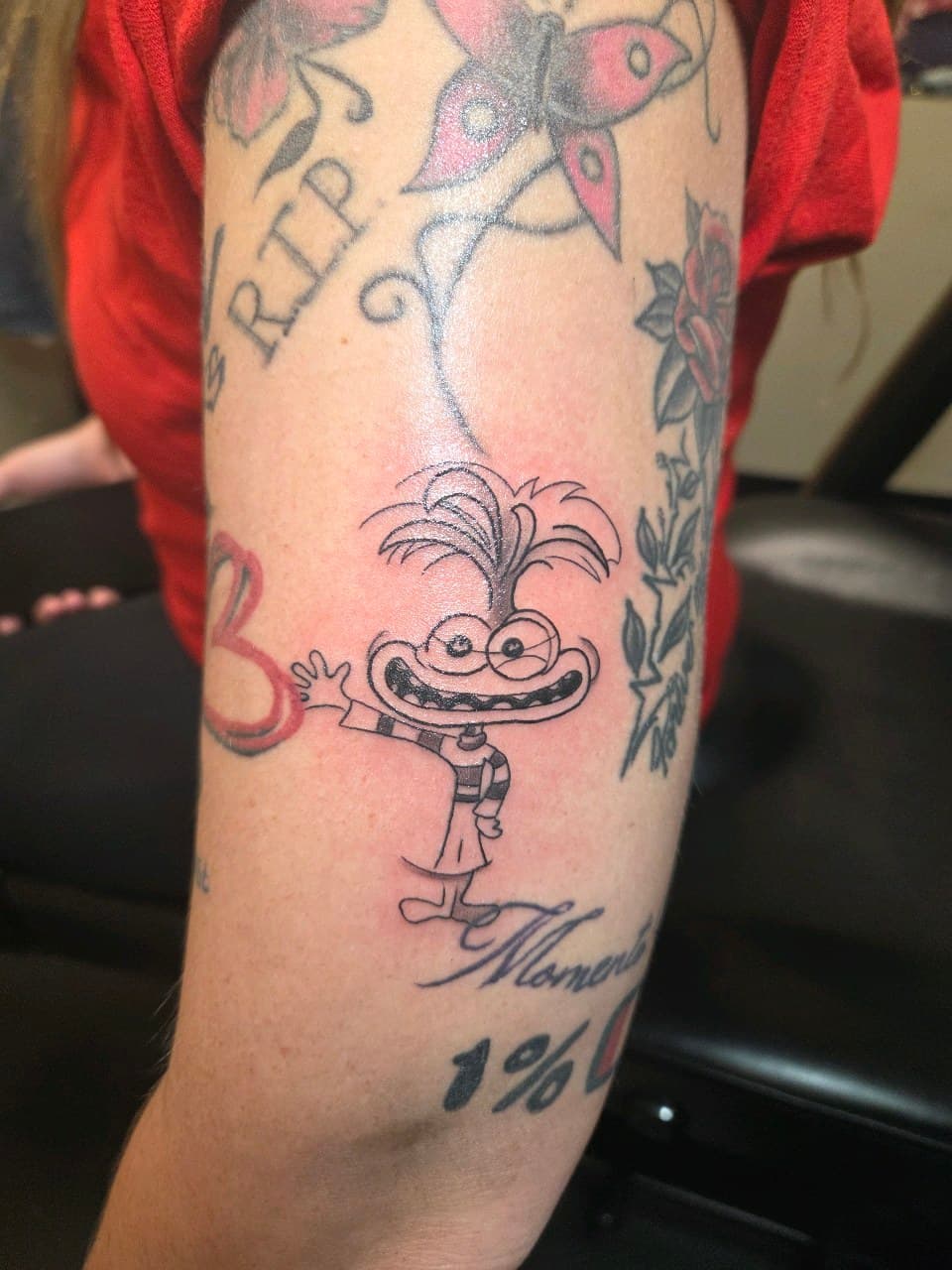 Cartoon + Line-work cartoon character tattoo on Upper Arm by 2nd_Circle_Tattoo_Co on TattMe