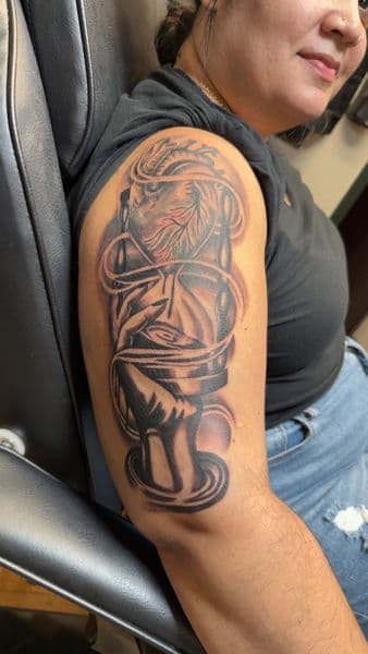 Black & Grey + Illustrative heart tattoo on Upper Arm by inkboiz on TattMe