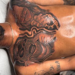 Black & Grey + Illustrative skull tattoo on Chest by 32_Incc_STUDIOS_LLC. on TattMe