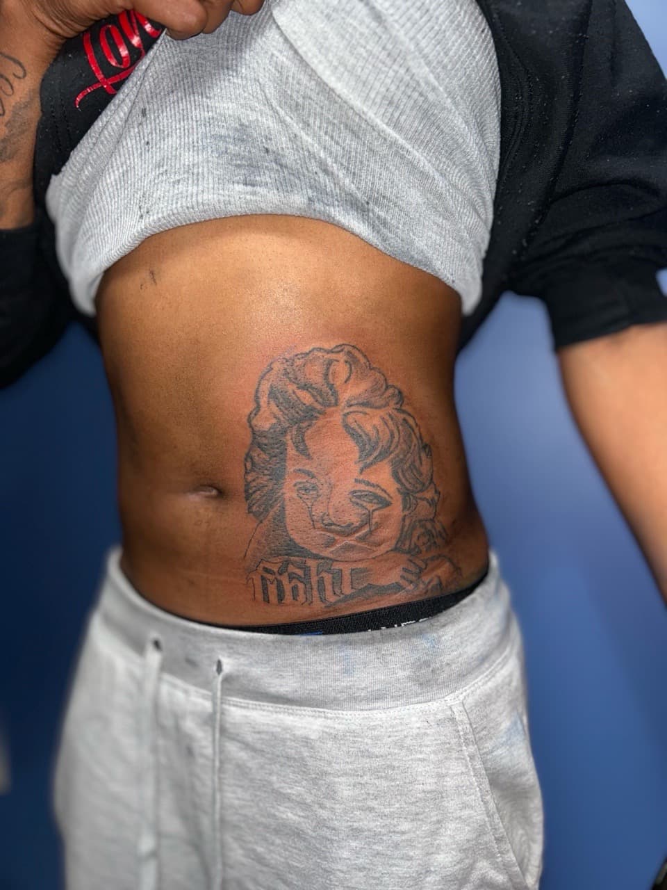 Black & Grey + Illustrative child tattoo on Ribs by 32_Incc_STUDIOS_LLC. on TattMe