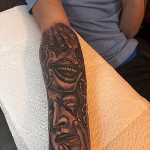 Black & Grey + Surrealism faces tattoo on Forearm by 32_Incc_STUDIOS_LLC. on TattMe