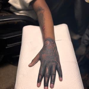 Black-work + Negative Space skeleton tattoo on Hand by 32_Incc_STUDIOS_LLC. on TattMe