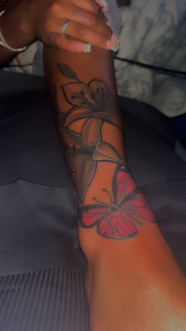 Floral + Black & Grey flowers tattoo on Forearm by 32_Incc_STUDIOS_LLC. on TattMe