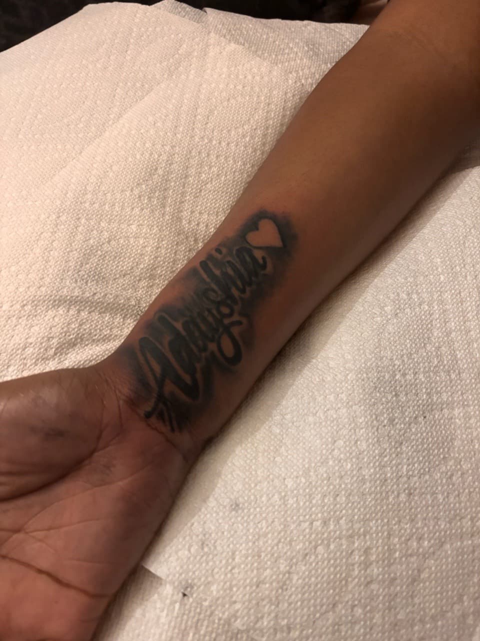 Lettering + Script name tattoo on Wrist by 32_Incc_STUDIOS_LLC. on TattMe