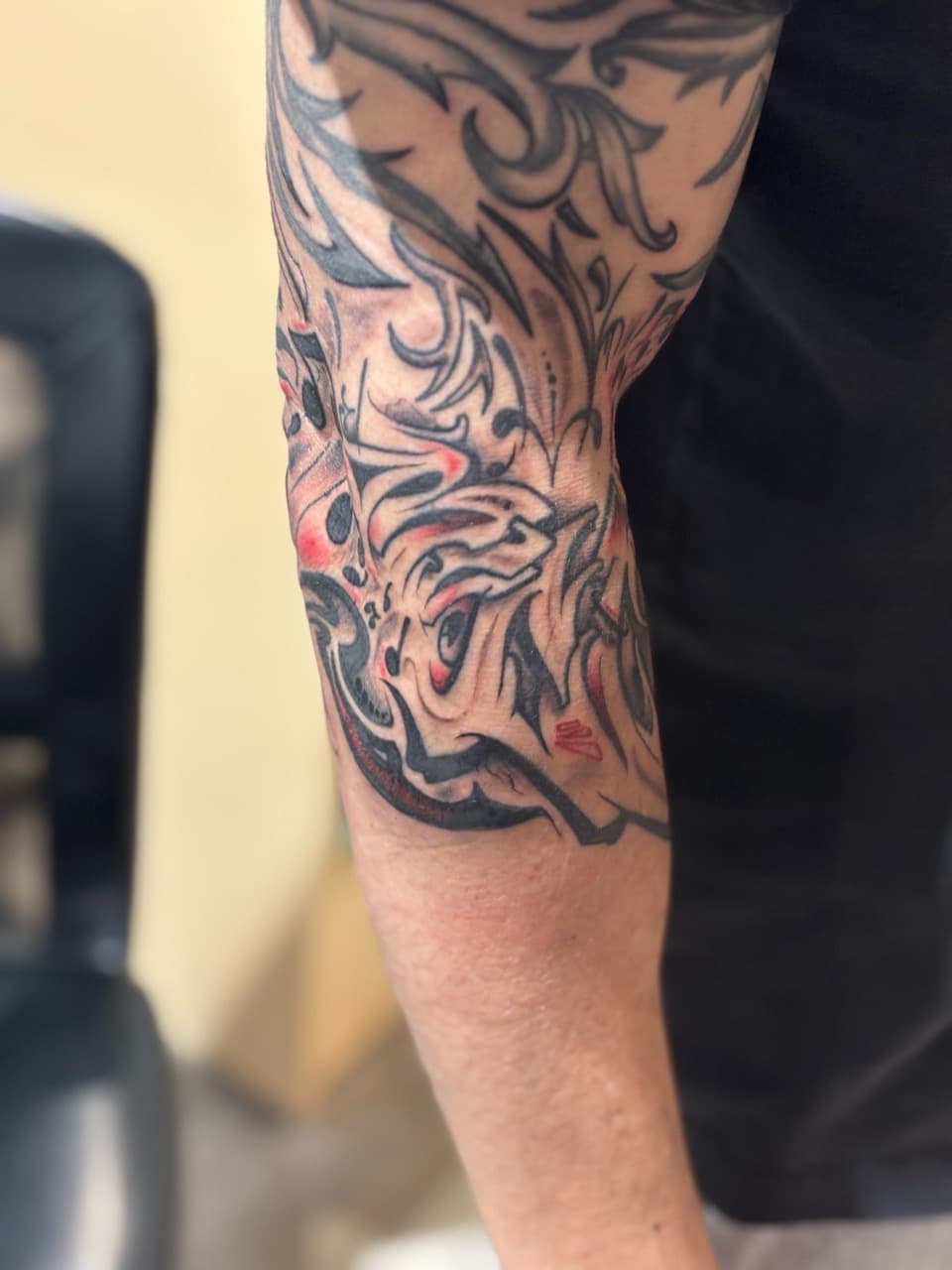 Tribal + Black-work swirls tattoo on Elbow by Brogan_Tattoos on TattMe