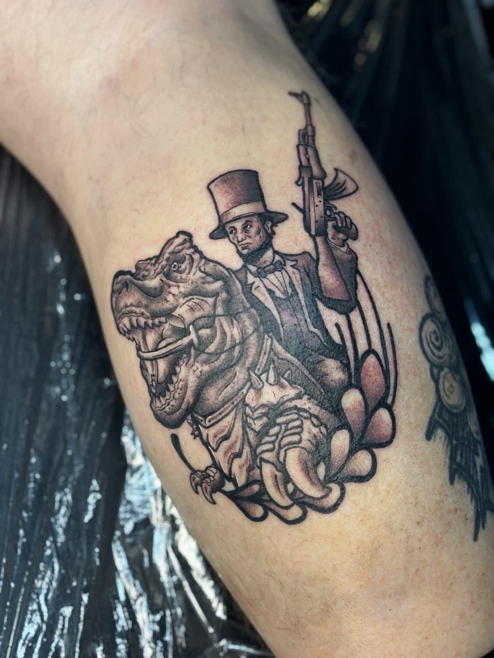 Black & Grey + Neo-Traditional lincoln tattoo on Calf by Brogan_Tattoos on TattMe