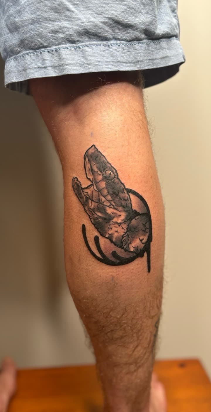 Black & Grey + Illustrative snake tattoo on Calf by Brogan_Tattoos on TattMe