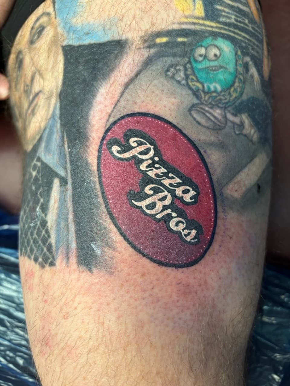 Lettering + Cartoon pizza bros tattoo on Thigh by Brogan_Tattoos on TattMe