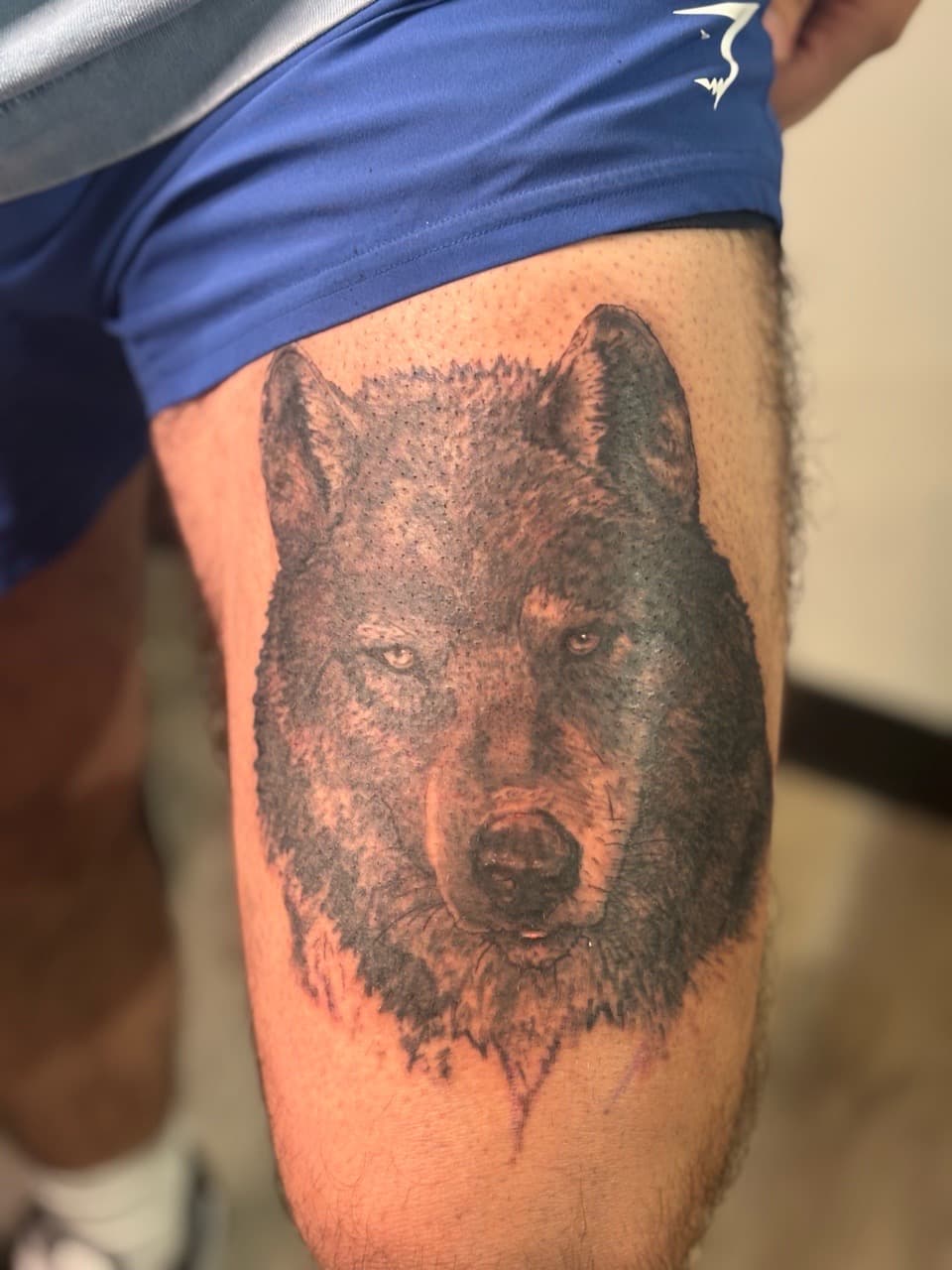 Black & Grey + Realism wolf tattoo on Thigh by Brogan_Tattoos on TattMe
