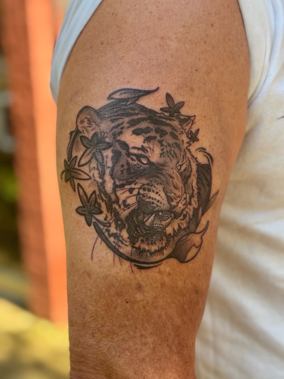 Black & Grey + Illustrative tiger tattoo on Upper Arm by Brogan_Tattoos on TattMe