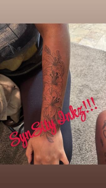 Floral + Line-work lilies tattoo on Forearm by SynSity_Inkz on TattMe