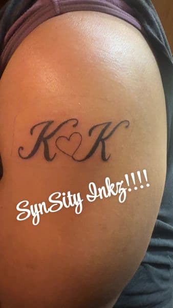 Lettering + Script initials tattoo on Upper Arm by SynSity_Inkz on TattMe