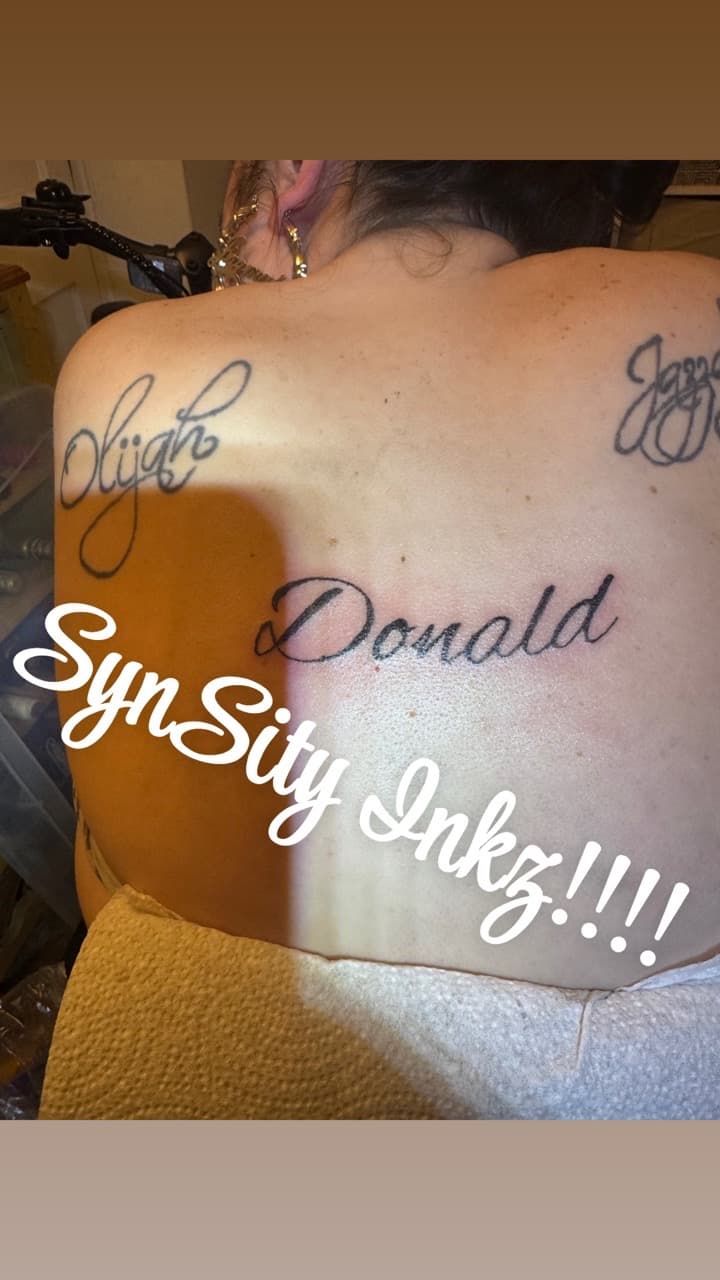 Lettering + Script names tattoo on Upper Back by SynSity_Inkz on TattMe