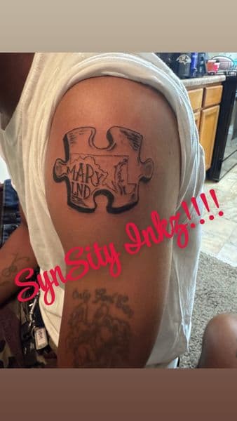 Black & Grey + Illustrative puzzle piece tattoo on Upper Arm by SynSity_Inkz on TattMe
