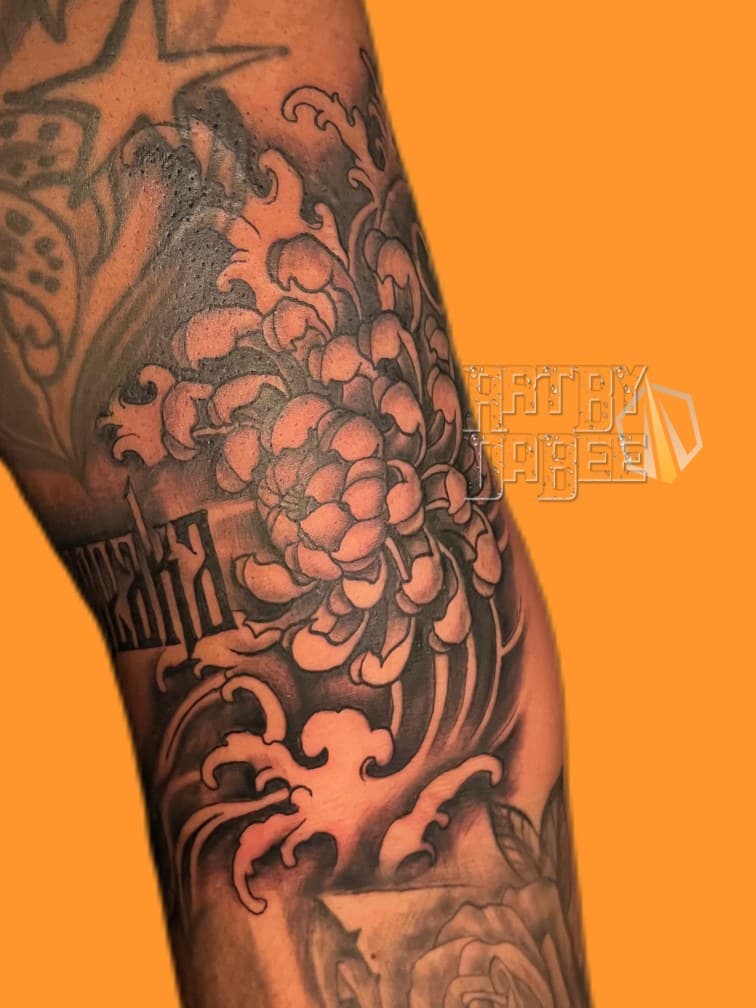 Japanese + Black & Grey chrysanthemum tattoo on Upper Arm by Artbydabee on TattMe