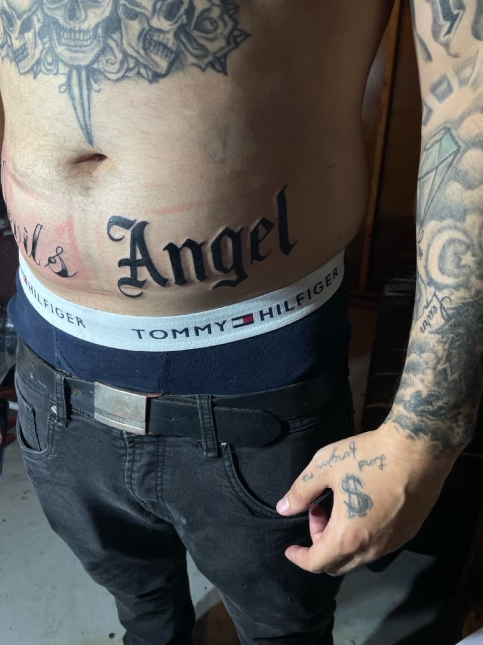 Lettering + Script skulls tattoo on Stomach by Pain_Ink on TattMe